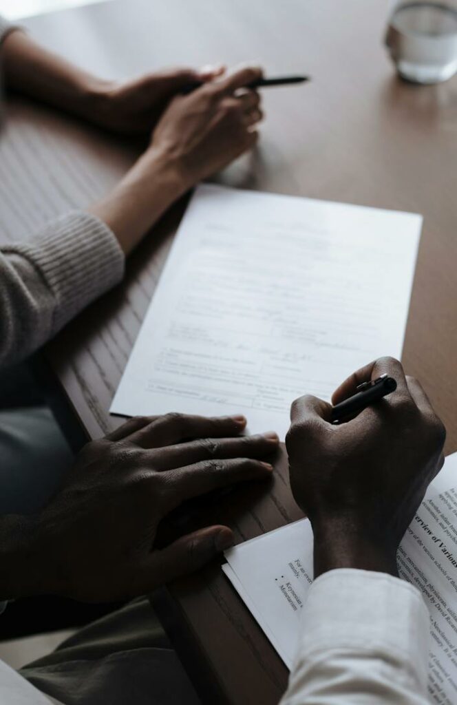 Man Signing Papers